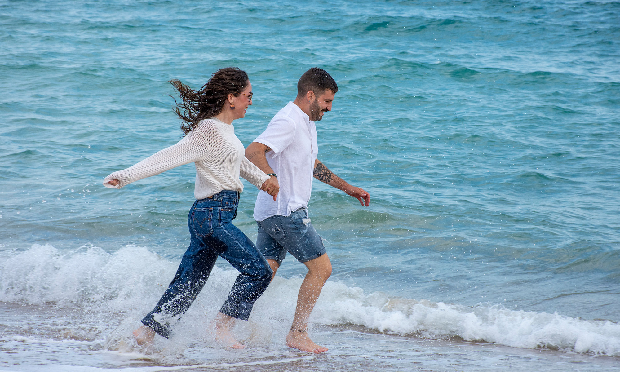 Una parella per la platja